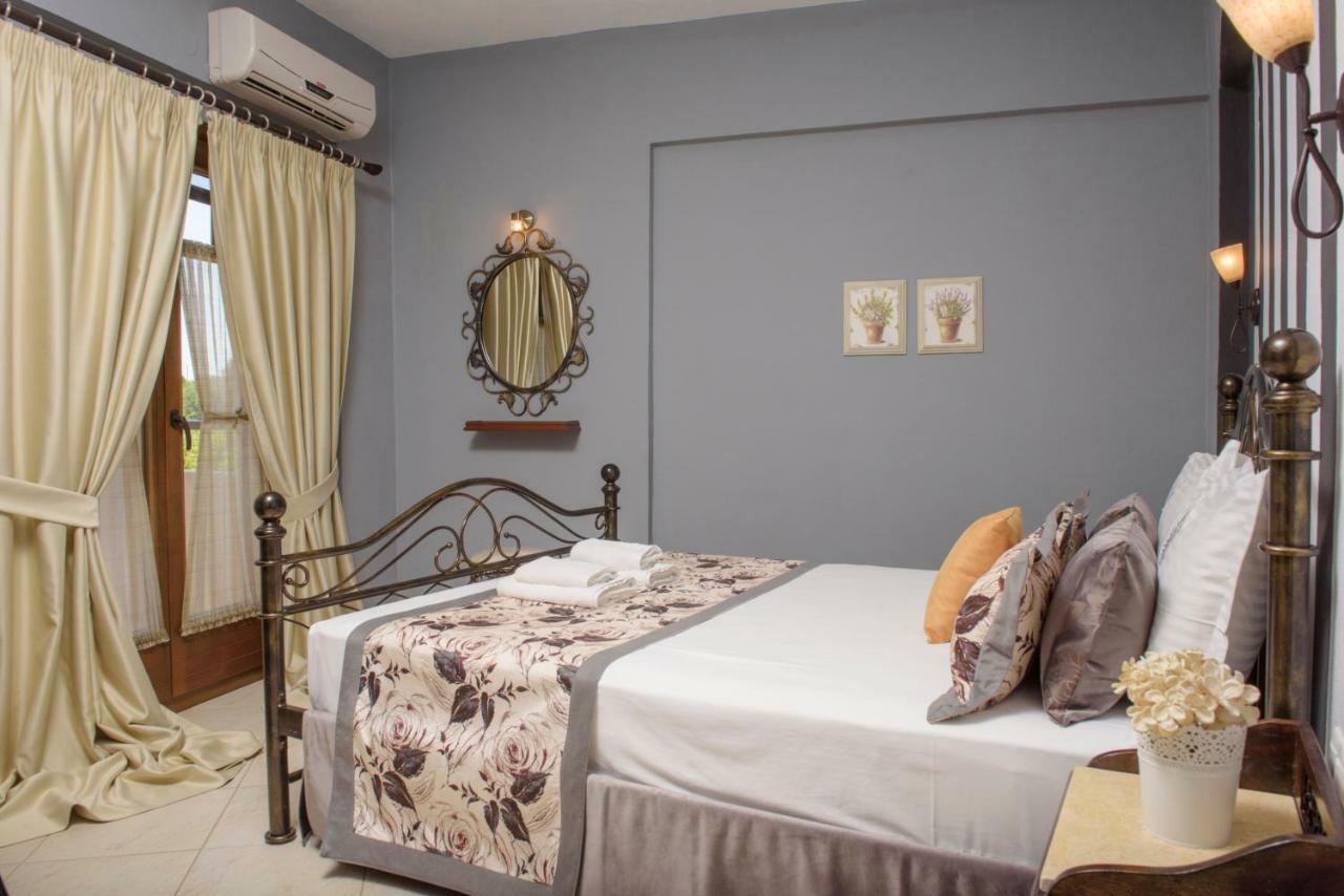 Apart Boutique Giorgos Amolianí Pokoj fotografie