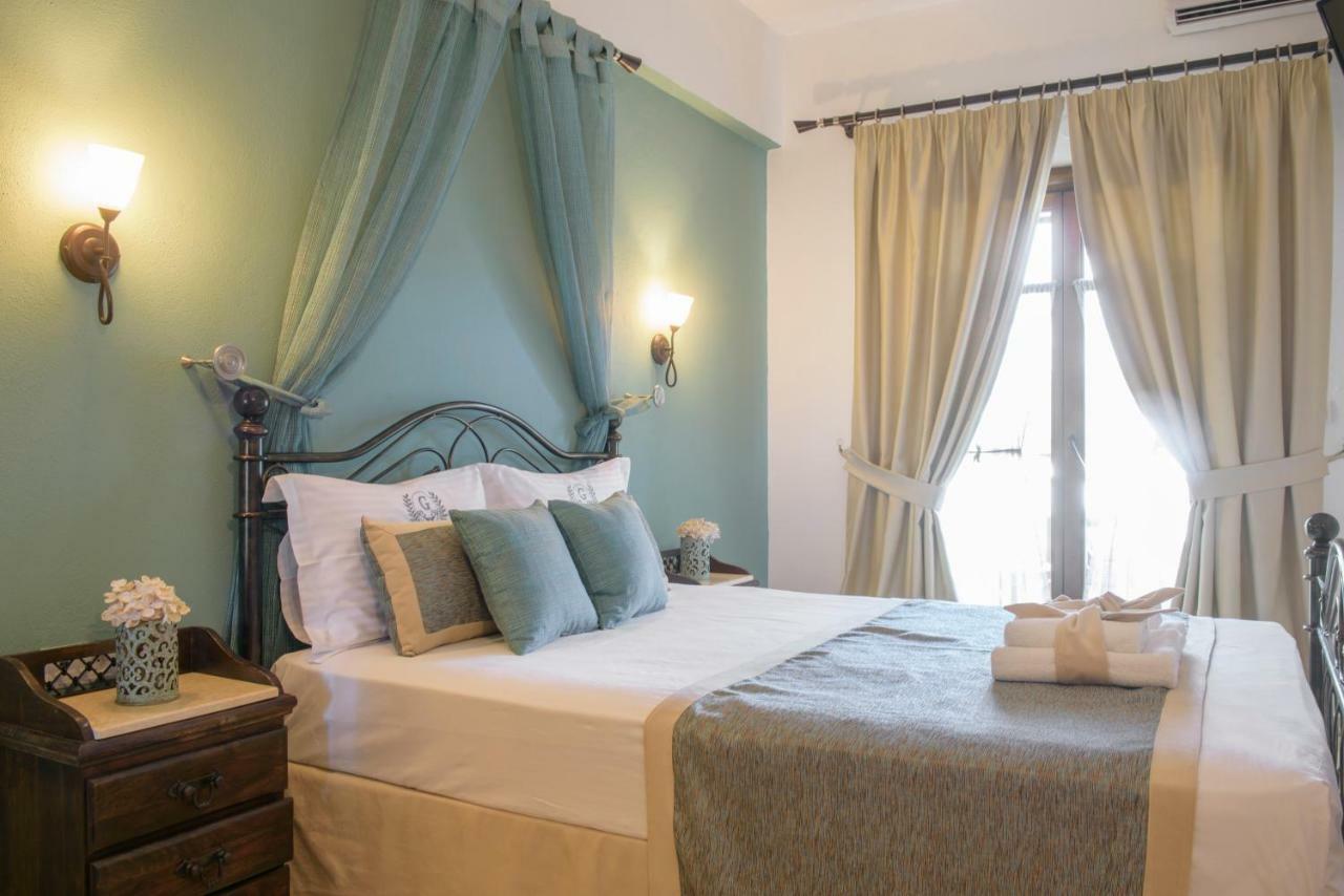 Apart Boutique Giorgos Amolianí Pokoj fotografie