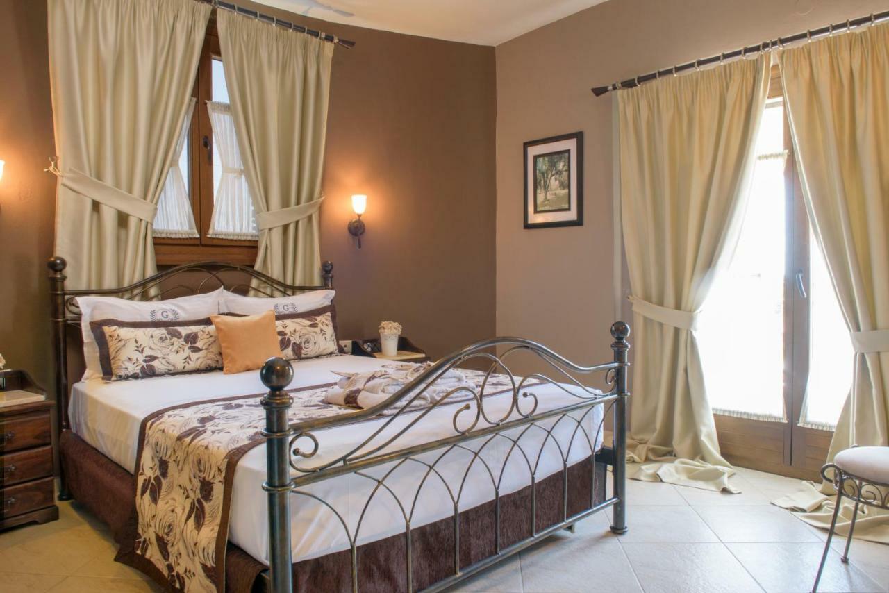 Apart Boutique Giorgos Amolianí Pokoj fotografie