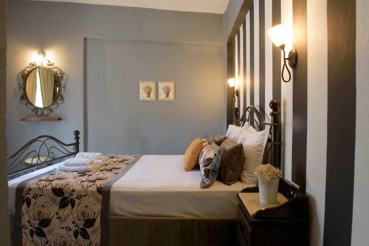 Apart Boutique Giorgos Amolianí Pokoj fotografie
