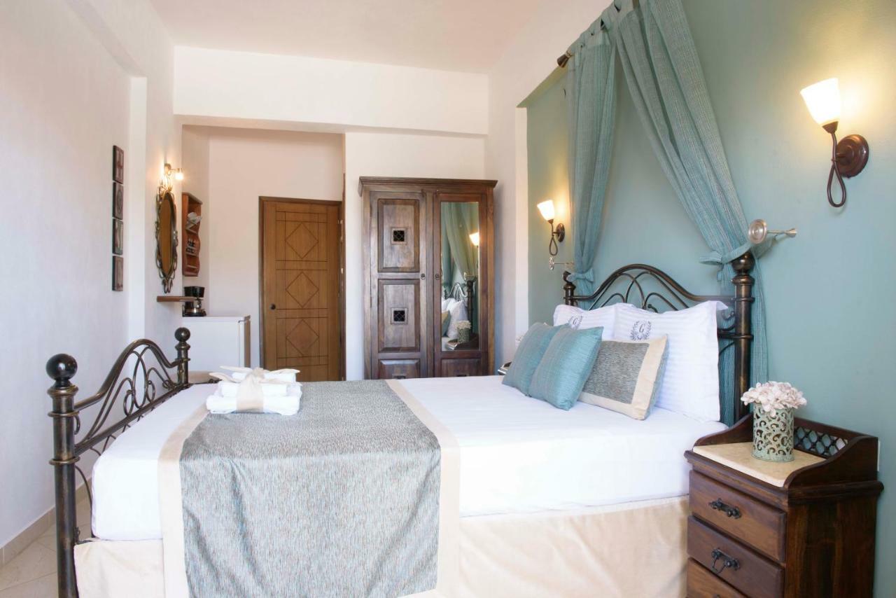 Apart Boutique Giorgos Amolianí Pokoj fotografie