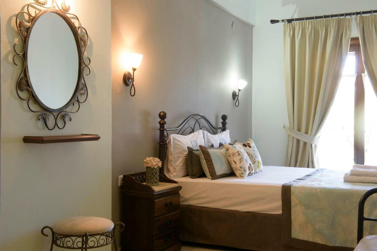 Apart Boutique Giorgos Amolianí Pokoj fotografie