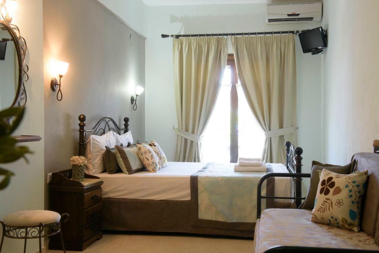 Apart Boutique Giorgos Amolianí Pokoj fotografie
