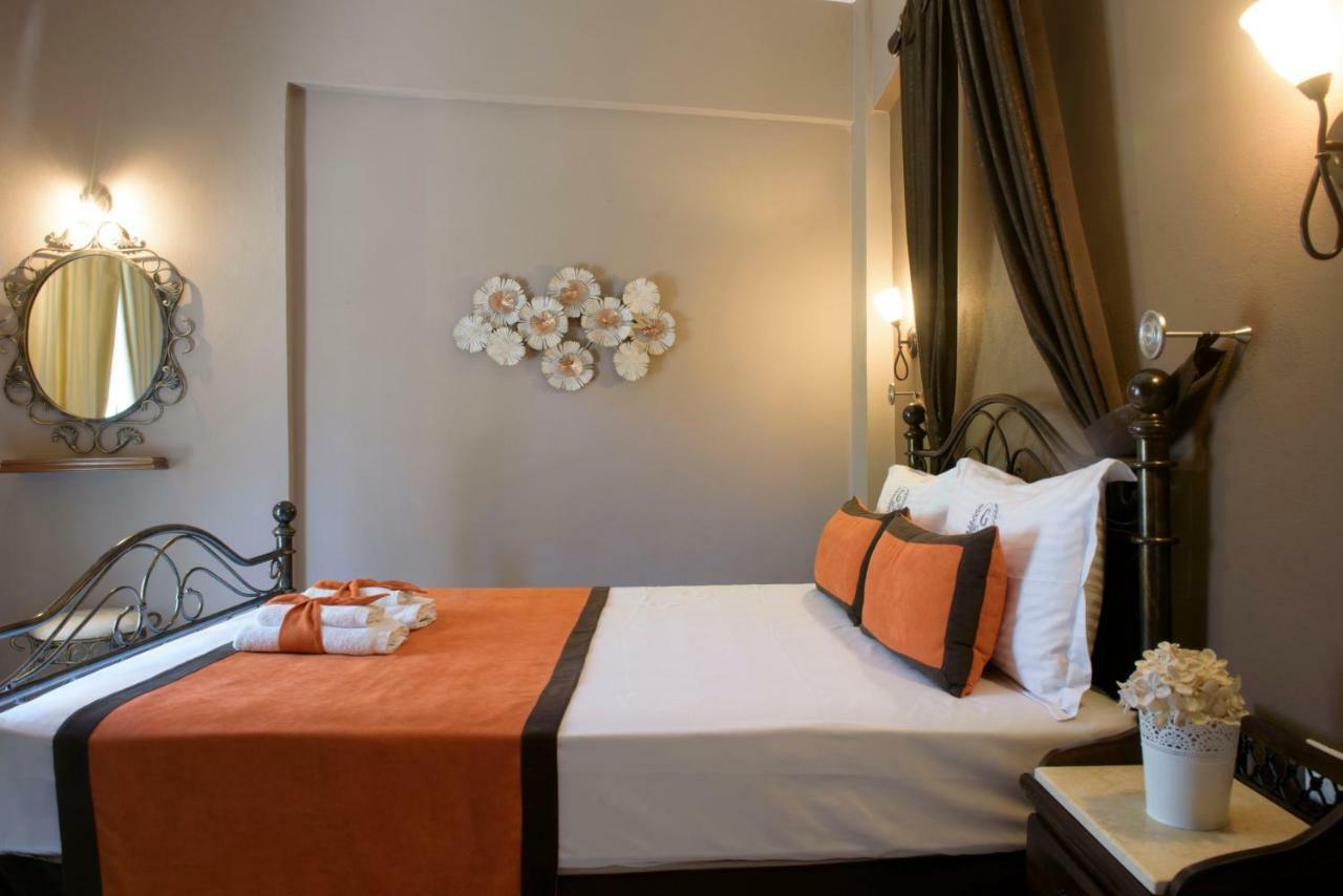 Apart Boutique Giorgos Amolianí Pokoj fotografie